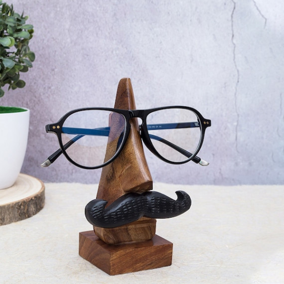 http://13.232.74.28/products/brown-handcrafted-eyeglass-holder-showpiece